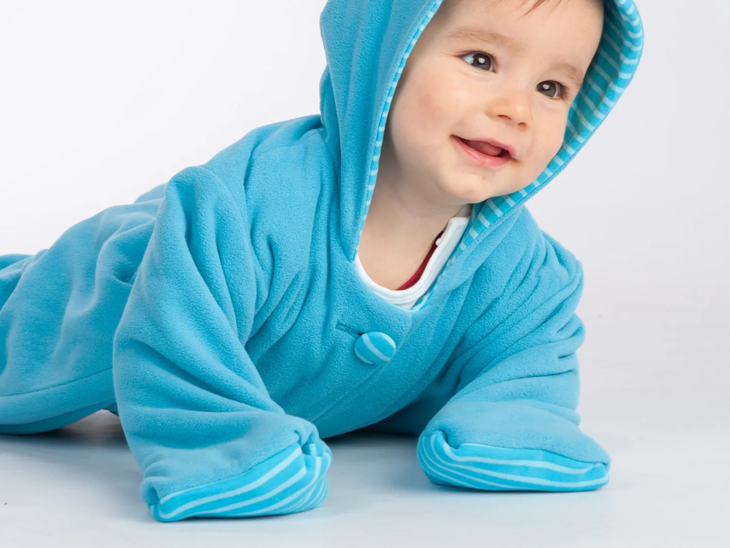 Lined baby overall pattern with hood, romper jumpsuit with feet and arm wrap. Hooded romper onesie sewing pattern DORIAN by Patternforkids