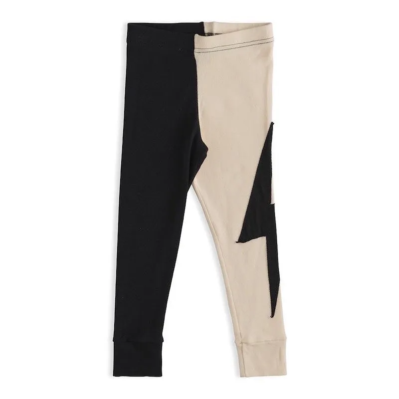 NUNUNU Divided Bolt Patch Leggings Black/ Natural